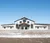 Image of fancy shed with welcoming entrance in winter blue skies