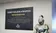 A picture of the old ƵCollege defender way plaque