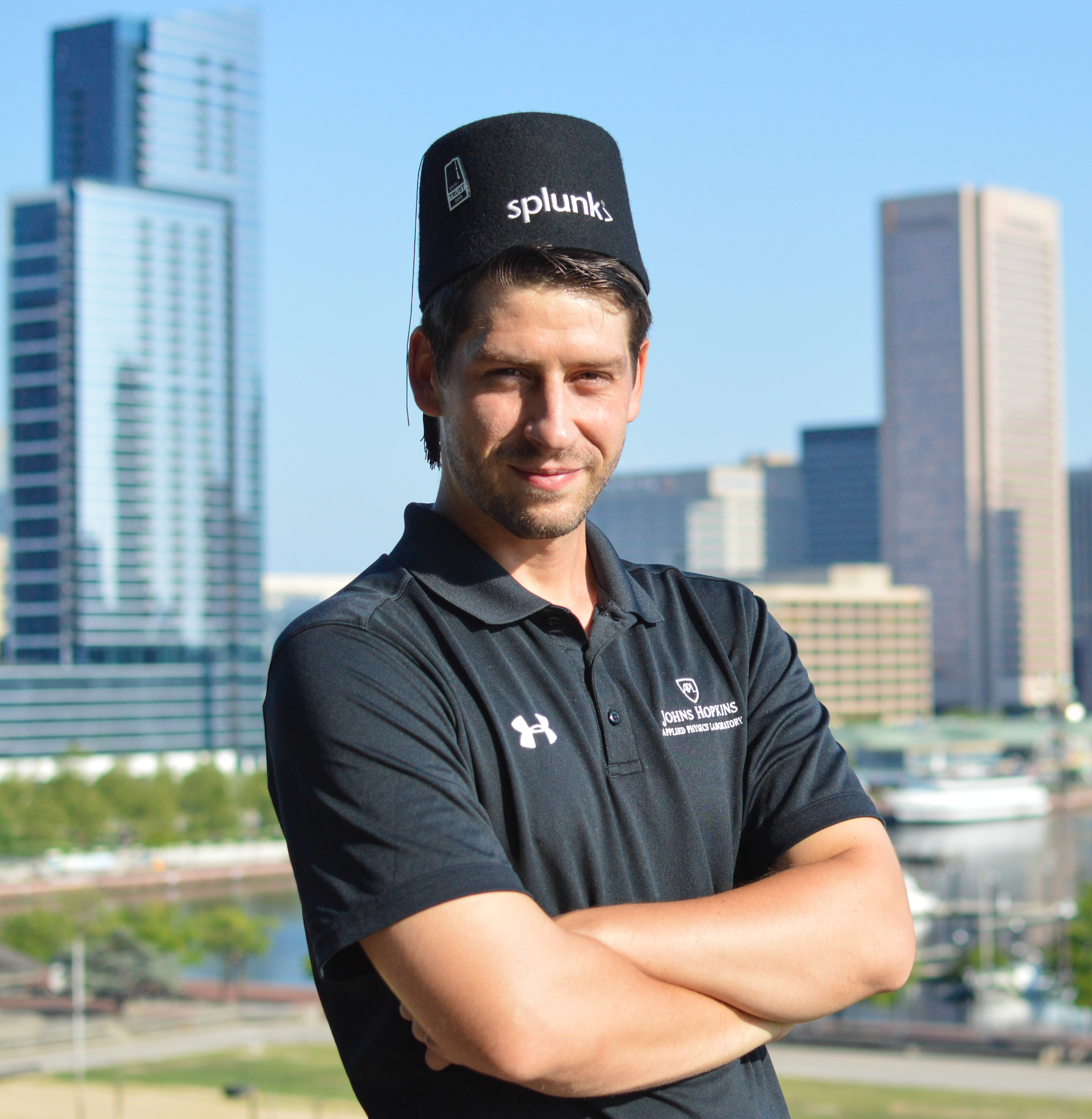 A picture of a man in a black shirt and a splunk hat