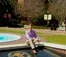 A student sits on Florida State University's campus