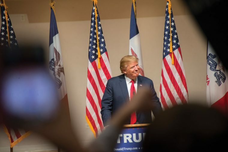 A picture of Donald Trump talking in the BJ Haan