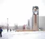 A picture of the clock tower in the snow