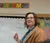 A student teacher stands at the front of class