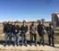 A picture of students holding shotguns at a trap shoot competition