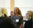 A picture of the women talking in the campus center