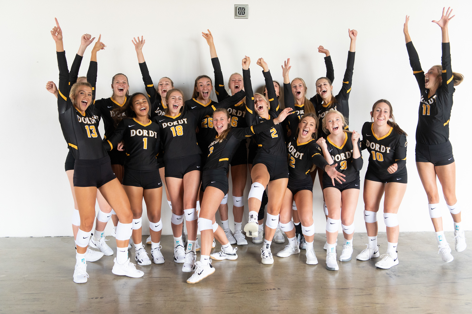 The Dordt volleyball team poses for a picture