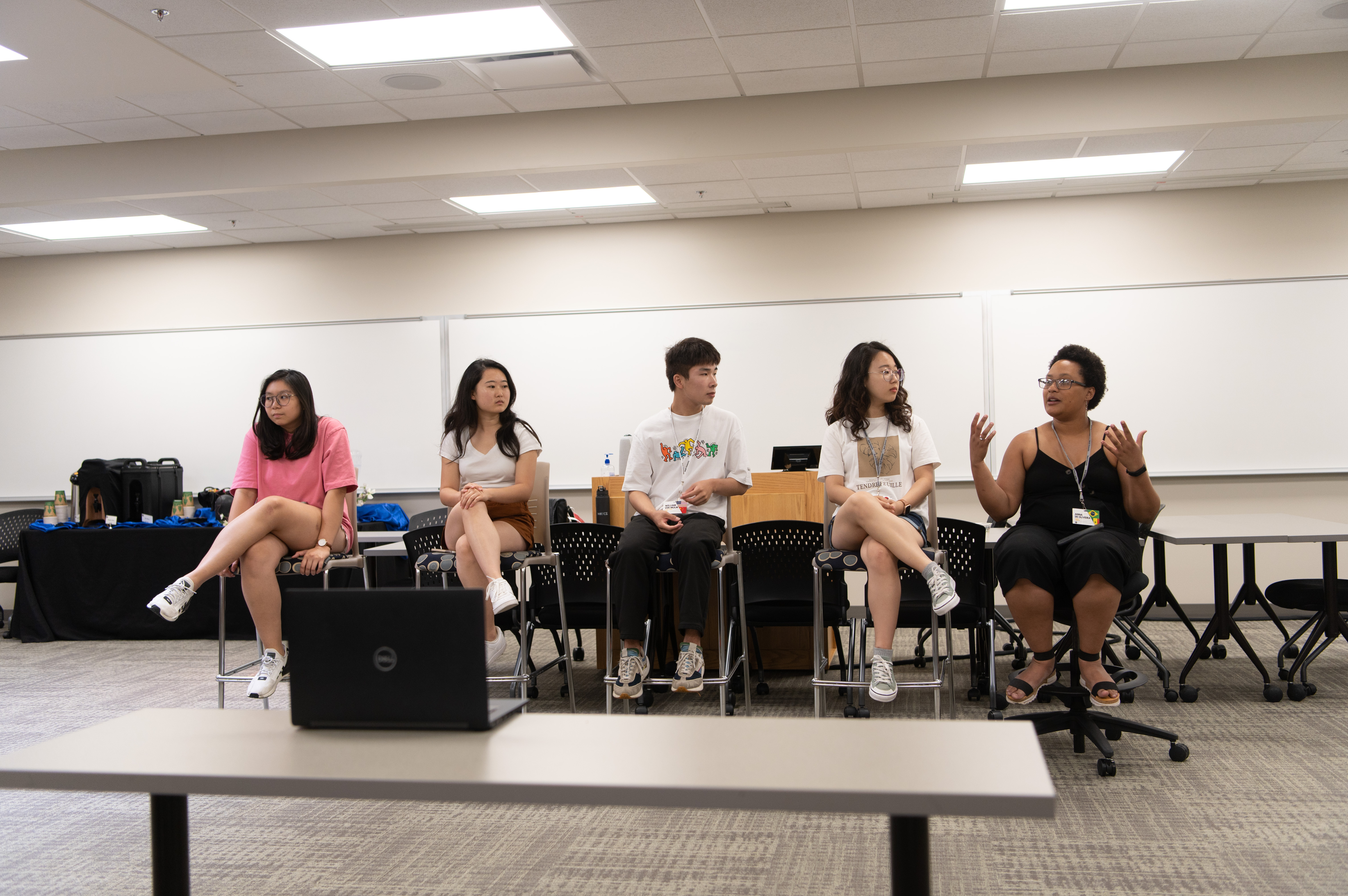 A group of international students record a presentation