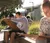 Male student in art class, drawing outside