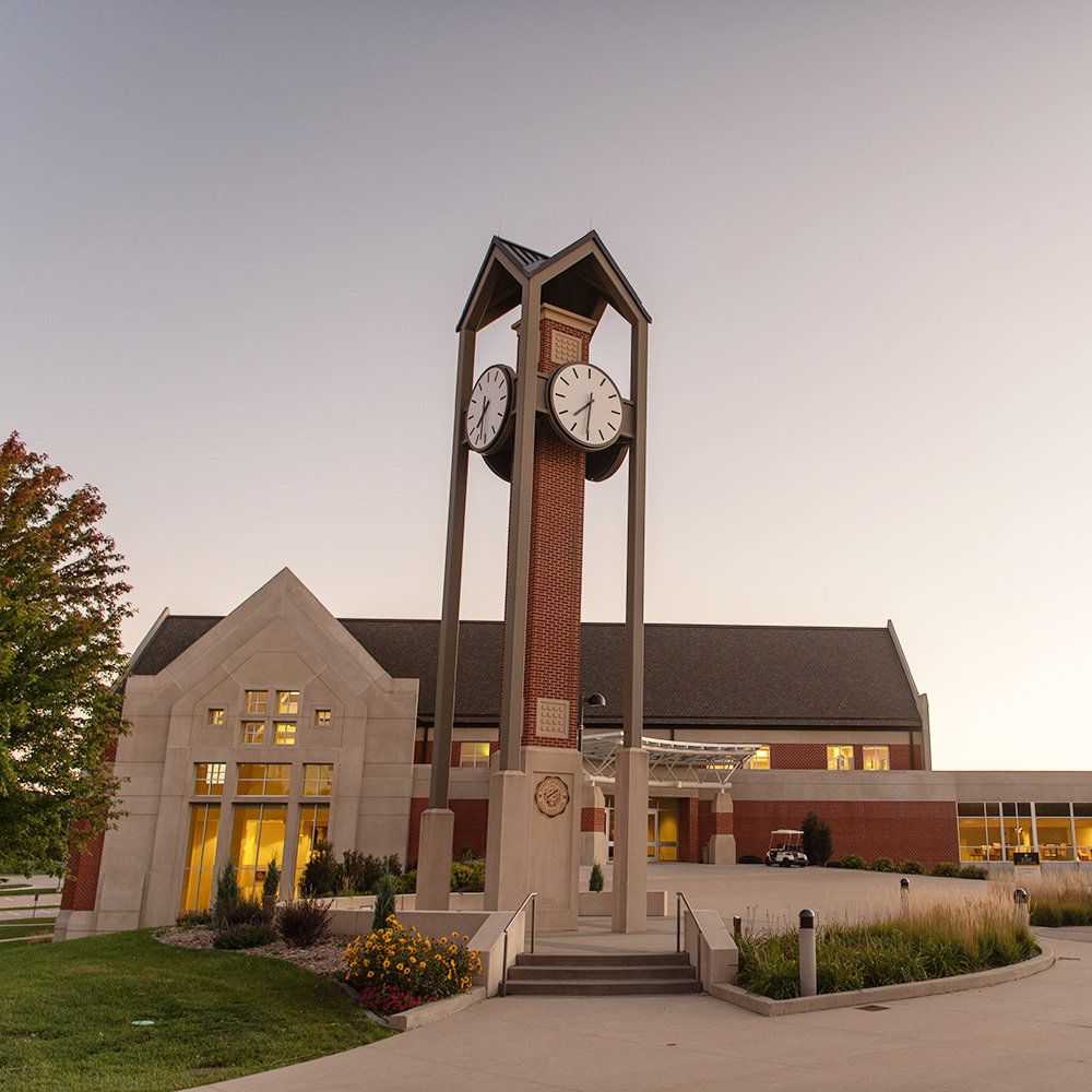 Clocktower and Campus Center building at dusk