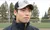 A picture of a man in a ƵDefenders baseball cap