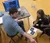 A professor showing a student how the technology works
