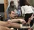 Students learning to tape a foot