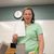 Female professor stops by her classes table