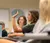 Female student raises her hand in class