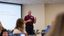 Male professor teaches his class