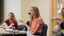 Female student speaking with her hands