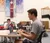Male student sitting in library