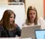 Female teacher helps student