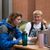 Male students discuss their homework