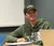 Male student sitting in class