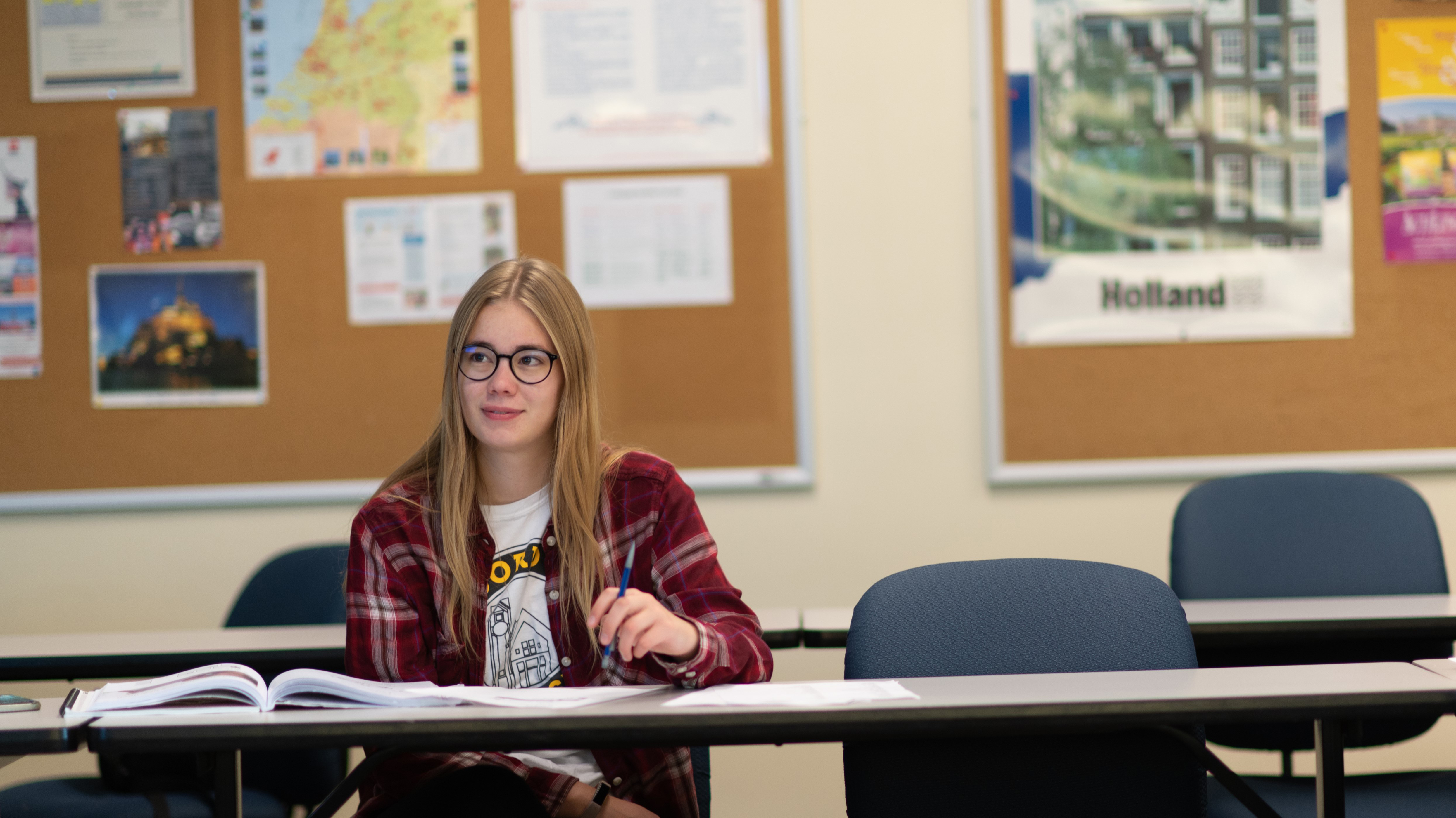 Female student holding her pencil