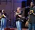 Students singing on stage