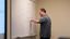 Male professor writing on the board