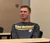 Male student listens in class