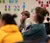 Male student listening in class
