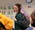 Female student gets up to leave class