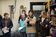 Students hold a clipboard on field trip