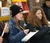 Female student uses a clipboard while learning