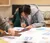 Male student works on blueprints
