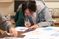 Male student works on blueprints