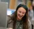 Female student smiles while she creates
