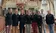 Students and faculty stand in front of famous organ