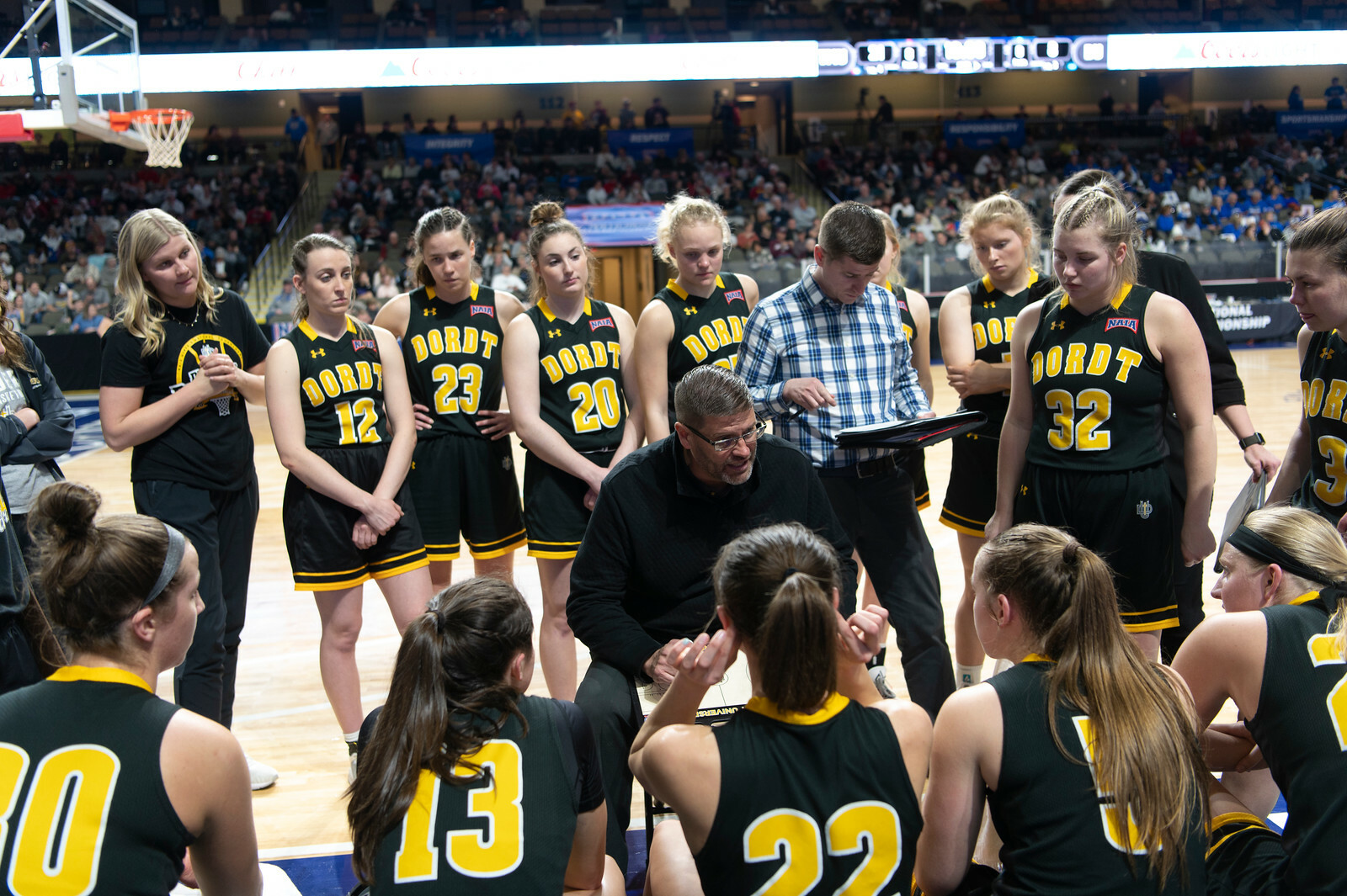 Dordt's women's basketball team during a time-out