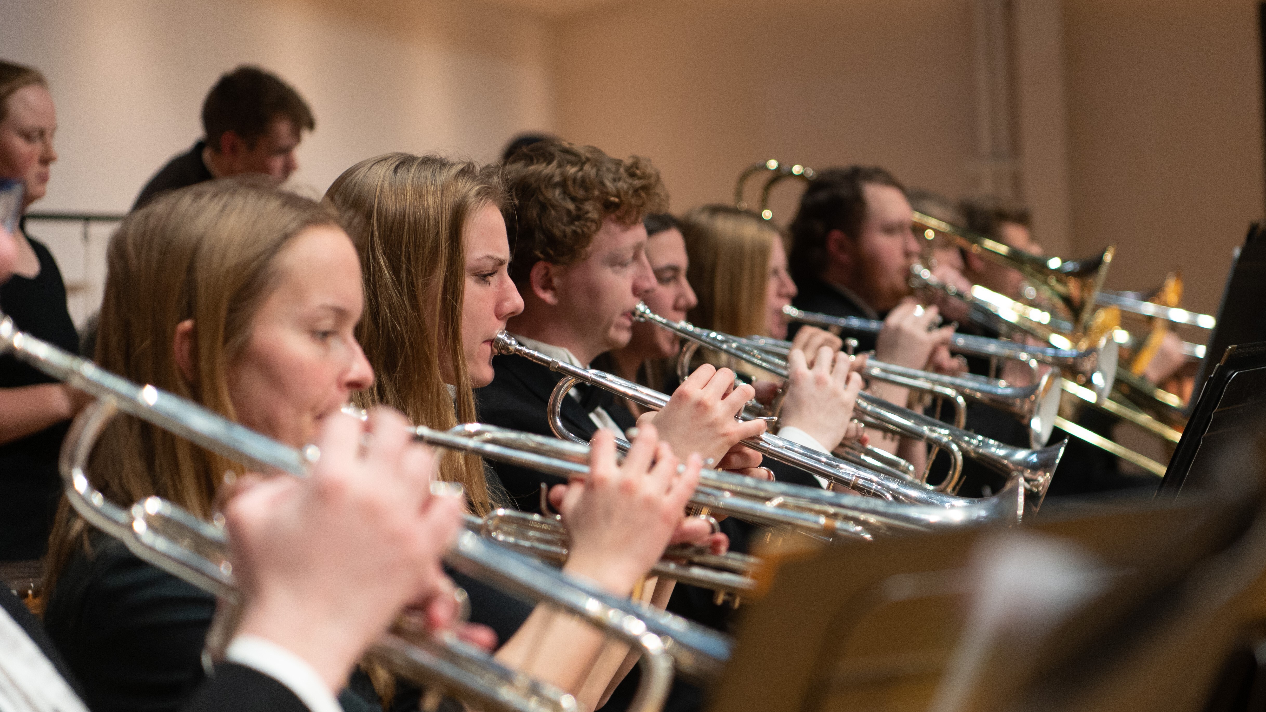 Students playing the trumpet