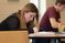 Female student writes in her journal