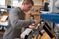 male student works on a system