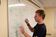 Student writes on whiteboard