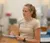 Female student writes in her notebook