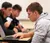 Male student using his computer