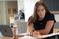 Female student writes in her binder