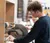 Male student uses a saw