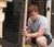 Male student uses a drill