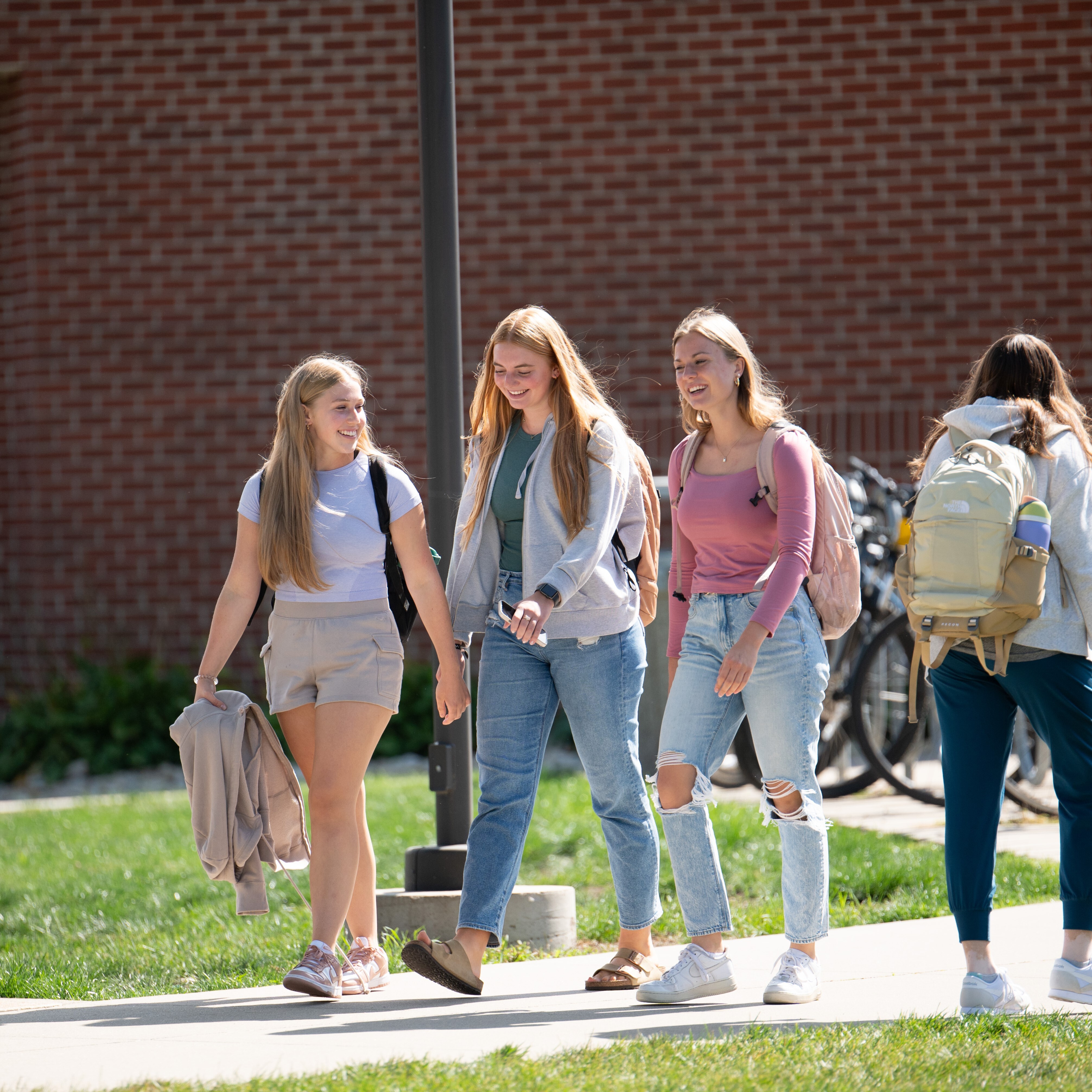 Female students walking a crossed campus