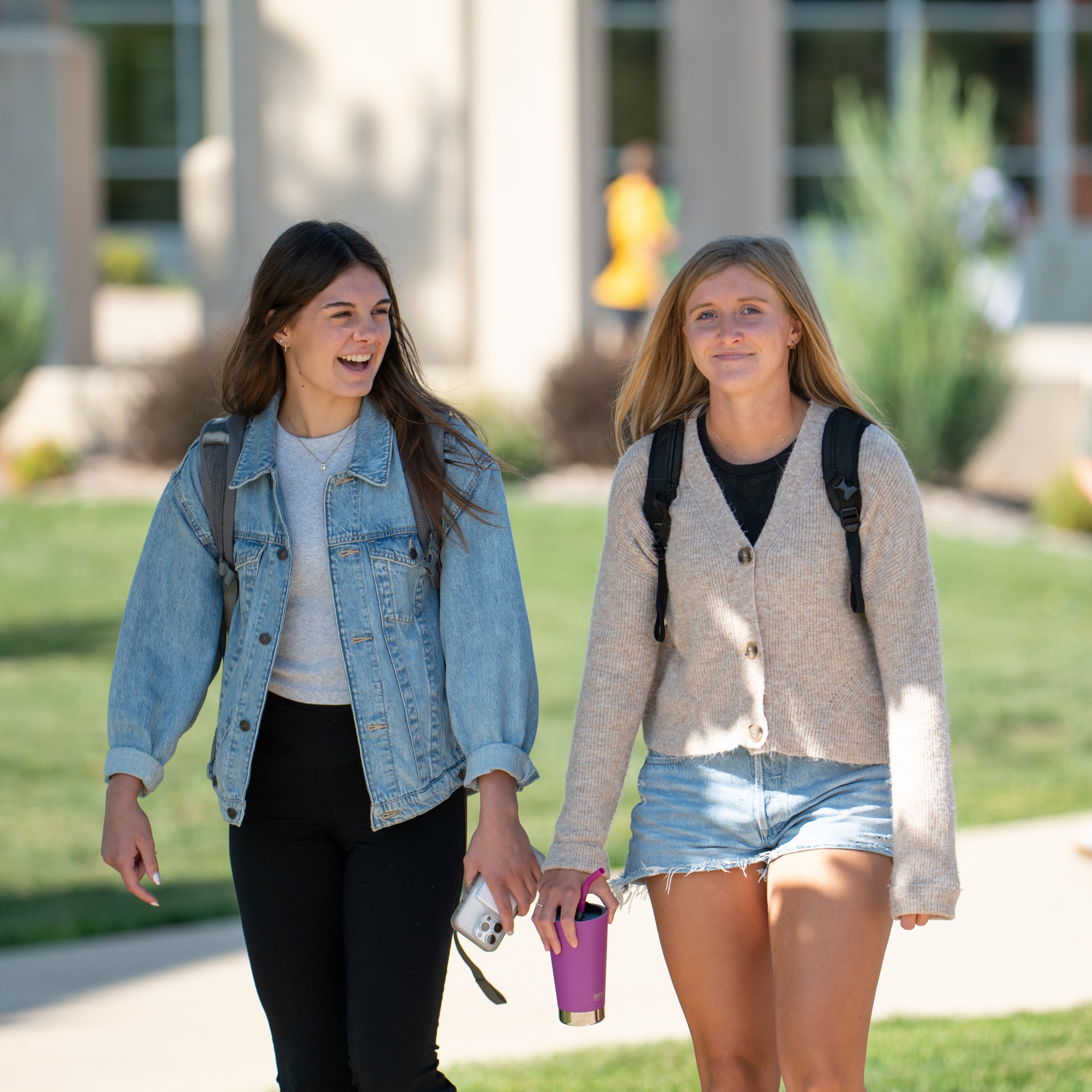 Students walking a crossed campus