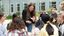 Students have a group discussion outside