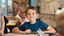 Male student smiles at the camera